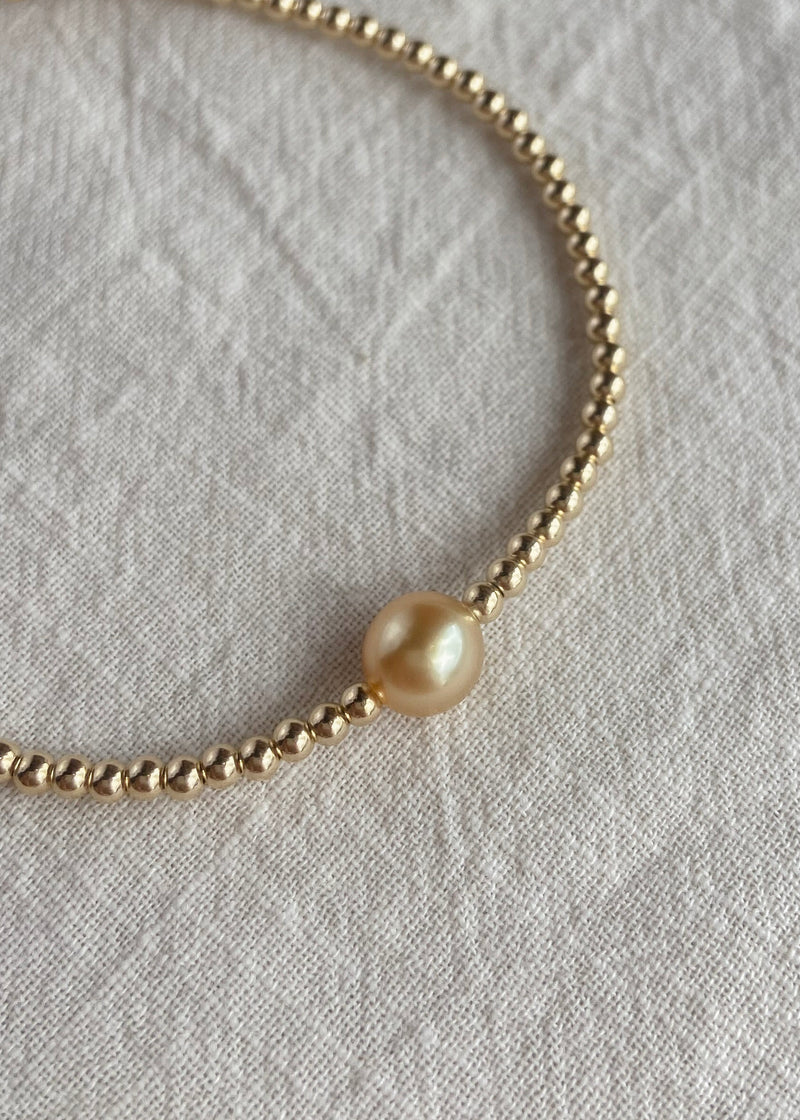 Stretchy Petit Golden South Sea Pearl bracelet